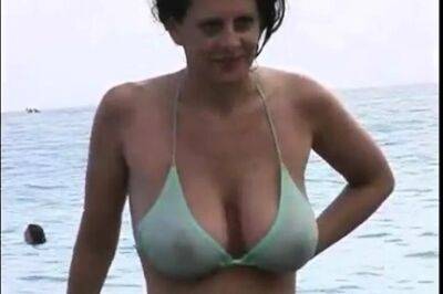 Hot MILF at beach in bikini - drtuber.com